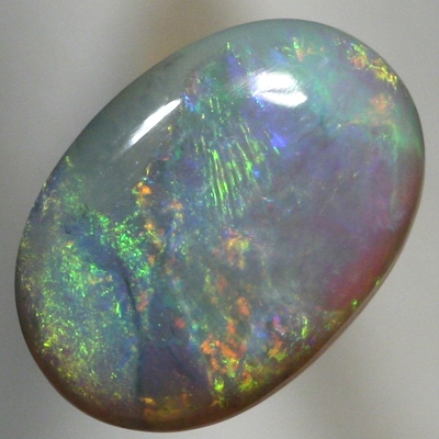 SOLID SEMI BLACK OPAL Quick changing fire, orange to green. Bright. SEE VIDEO